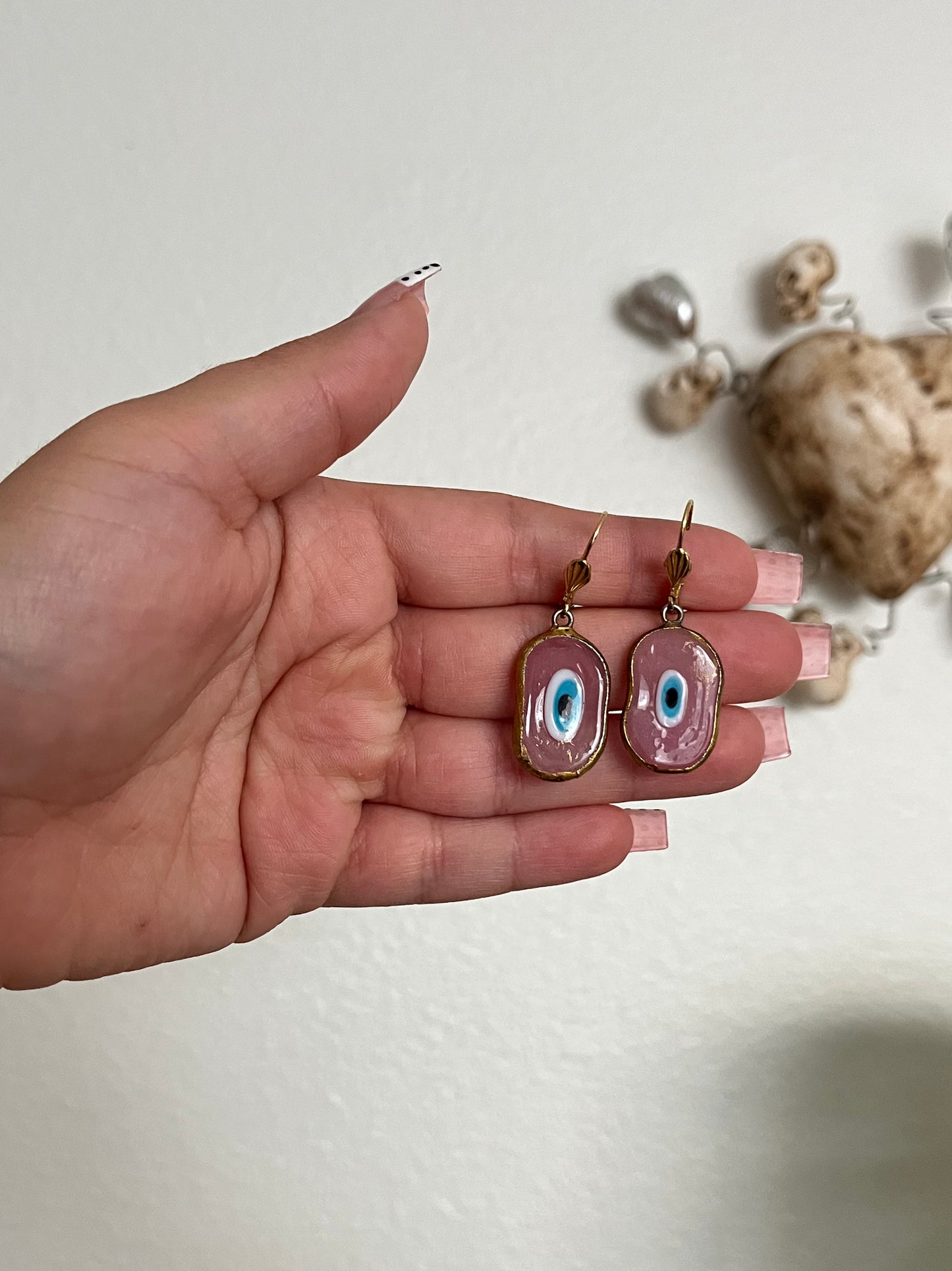 Vintage pink evil eye earrings