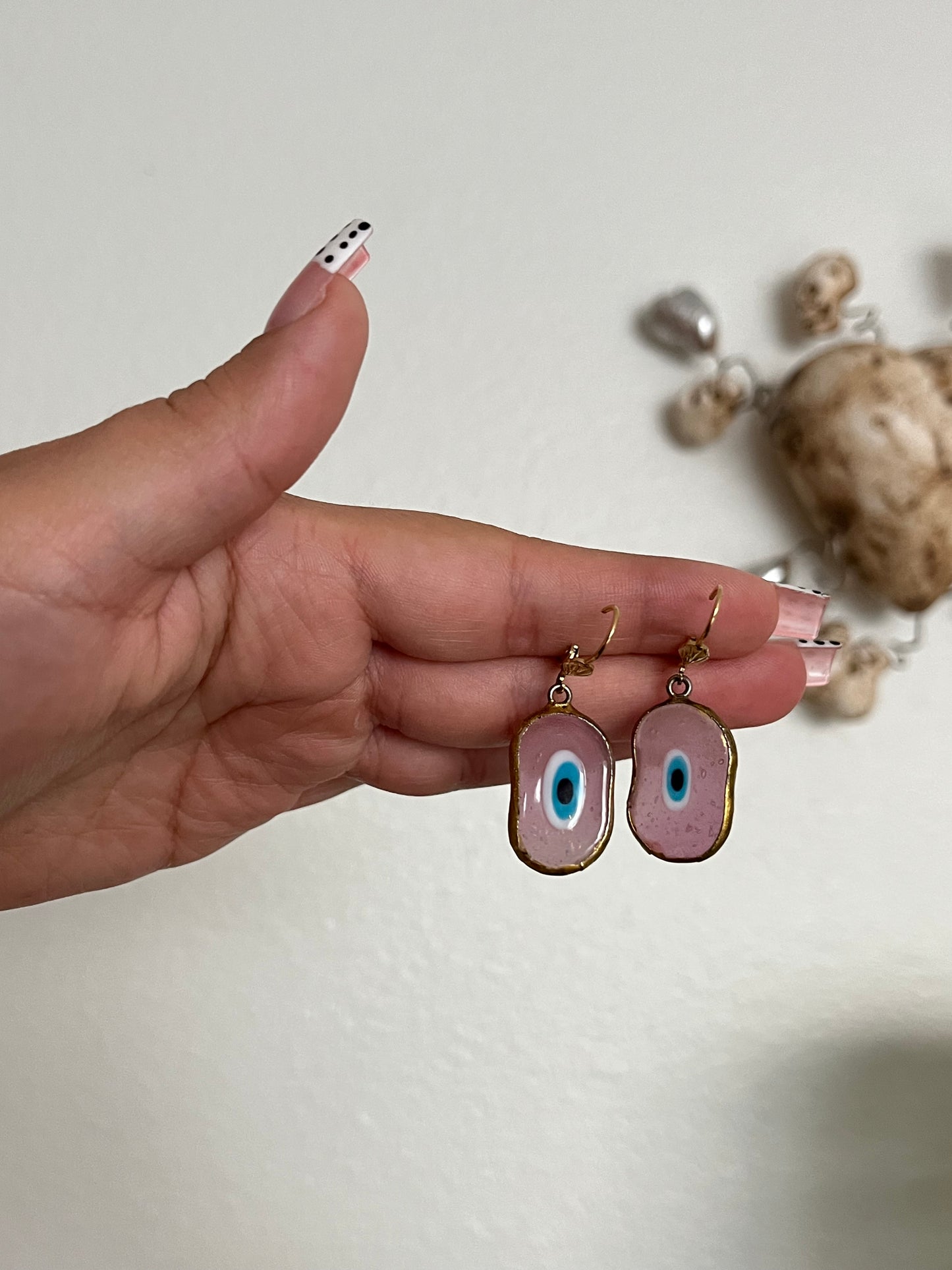 Vintage pink evil eye earrings